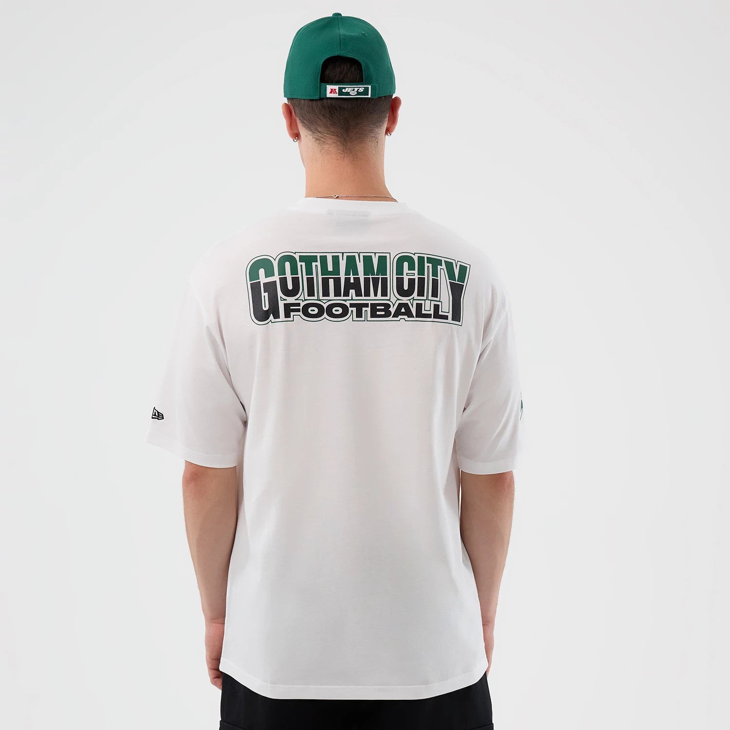 The Male model is wearing New York Jets NFL International Series Games White Oversized T-Shirt 2