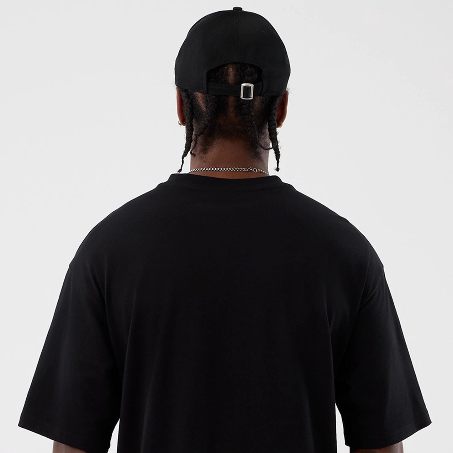 The Male model is wearing Berlin NFL International Series Games Black Oversized T-Shirt 7