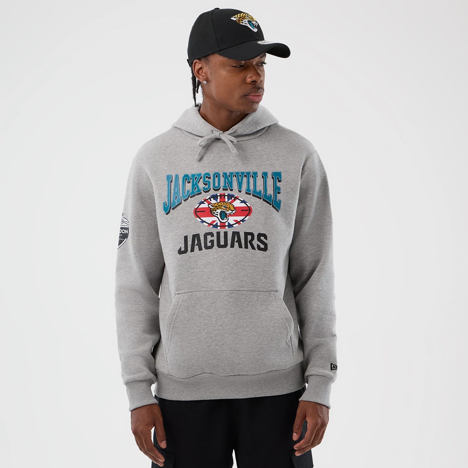 The Male model is wearing Jacksonville Jaguars NFL International Series Games Grey Pullover Hoodie 1