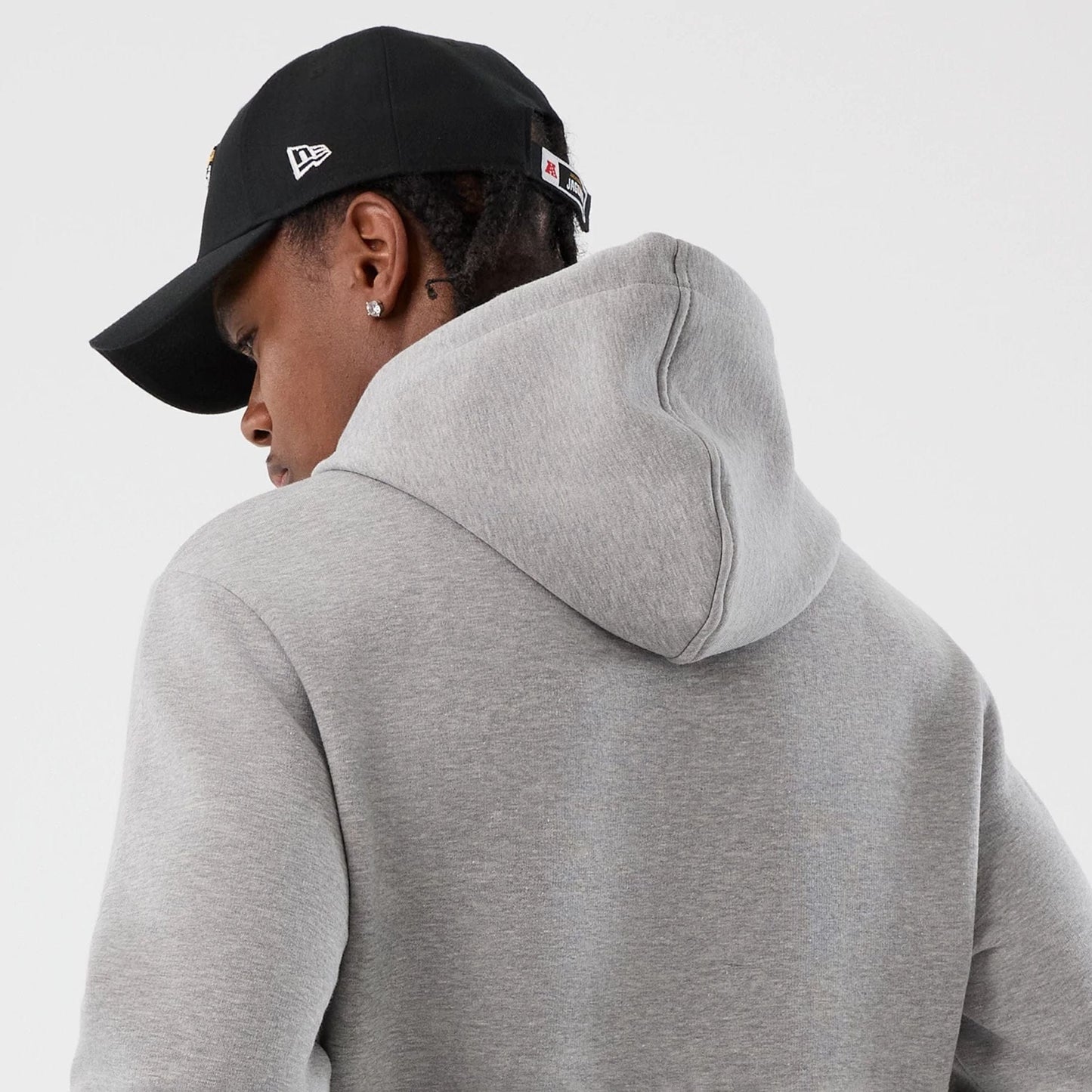 The Male model is wearing Jacksonville Jaguars NFL International Series Games Grey Pullover Hoodie 7