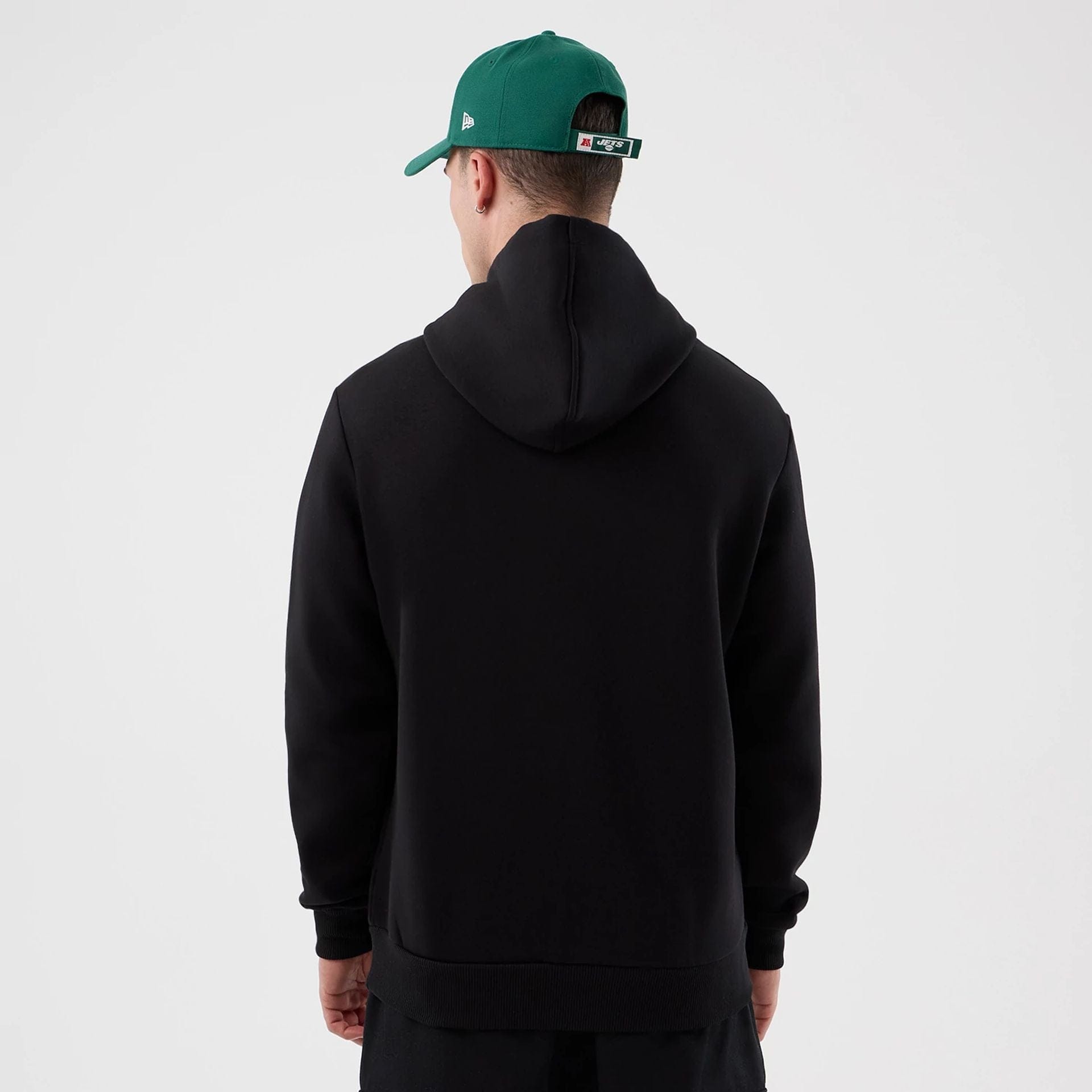 The Male model is wearing New York Jets NFL International Series Games Black Pullover Hoodie 2