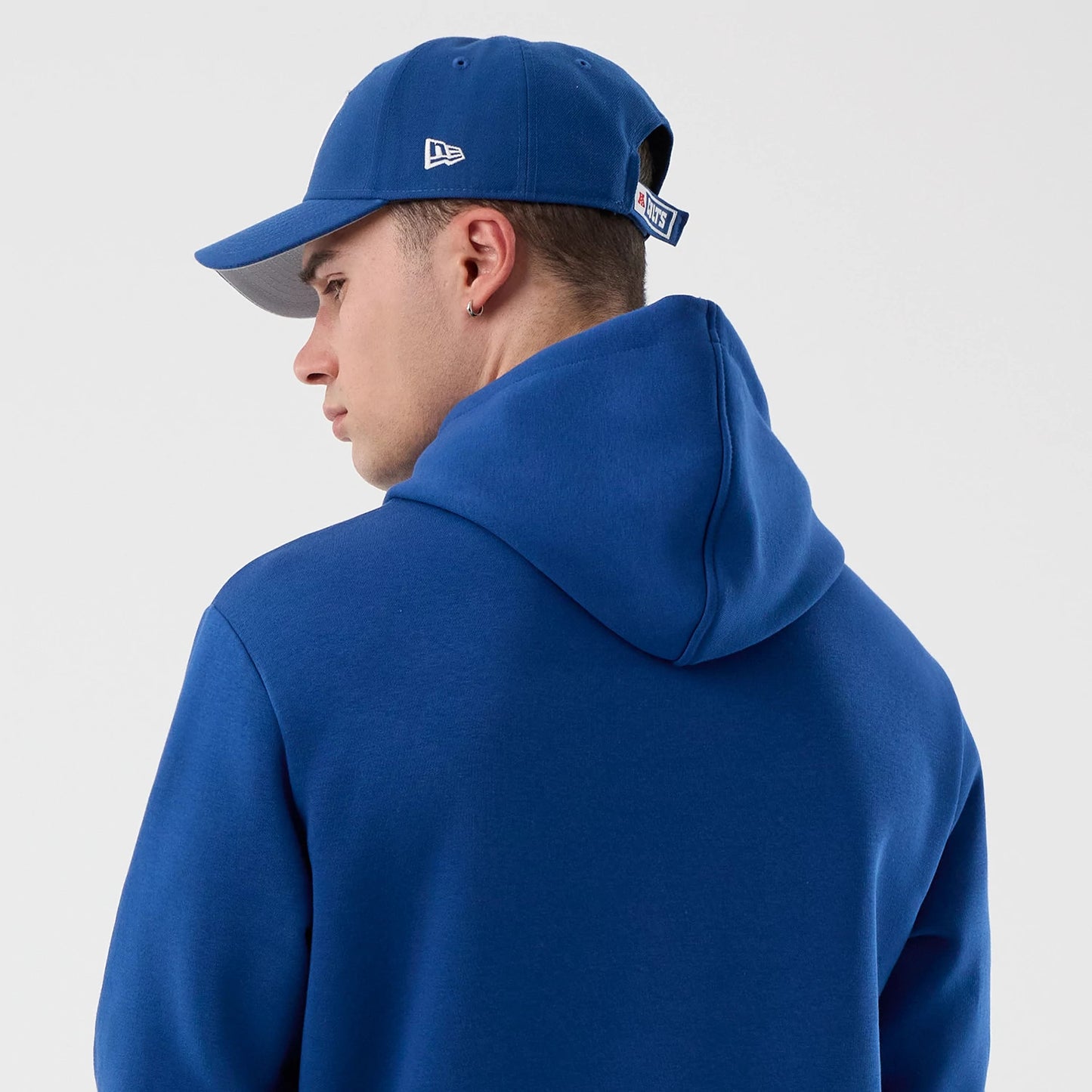The Male model is wearing Indianapolis Colts NFL International Series Games Blue Pullover Hoodie 7