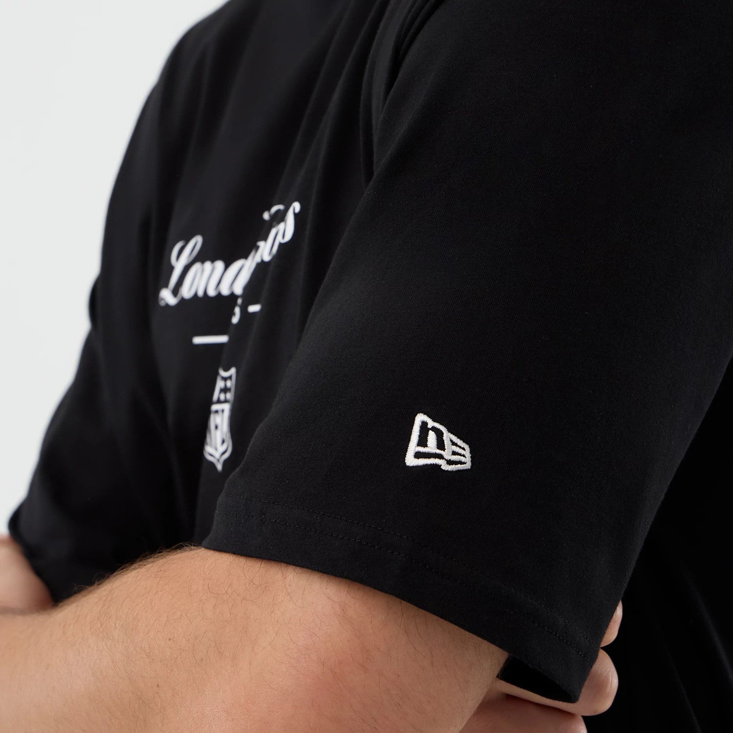 The Male model is wearing London Games NFL International Series Games Black Oversized T-Shirt 4