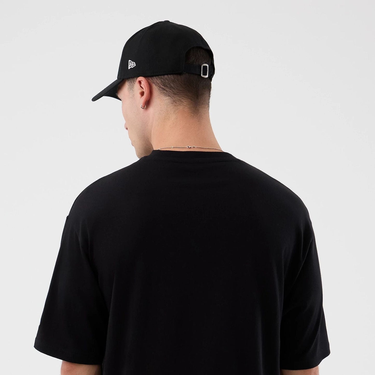 The Male model is wearing London Games NFL International Series Games Black Oversized T-Shirt 7