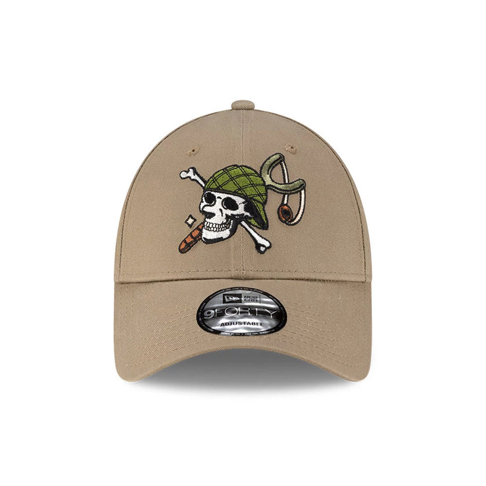 One Piece Usopp Beige New Era 9FORTY Adjustable Cap, front view showing the embroidered green hat logo with a skull and crossbones on the centre of the beige crown, complemented by a black 9FORTY size sticker on the curved visor.
