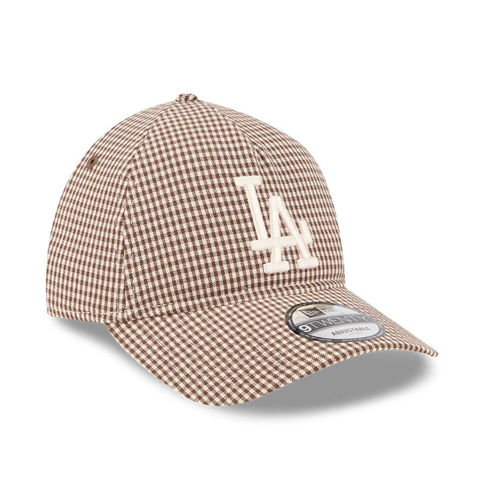 LA Dodgers MLB Check Open Brown New Era 9TWENTY A-Frame Adjustable Cap, three-quarter view showing the raised white LA logo embroidered on the front panels, set against a brown check pattern, with a 9TWENTY size sticker on the curved visor.