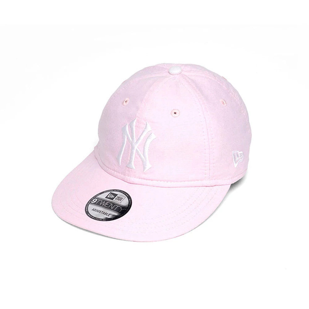 New York Yankees MLB Oxford Pastel Pink New Era 9TWENTY Long Visor Adjustable Cap, front view showing the white raised embroidered NY logo on the front panel, long pink visor with 9TWENTY size sticker, and New Era flag logo on the left side.