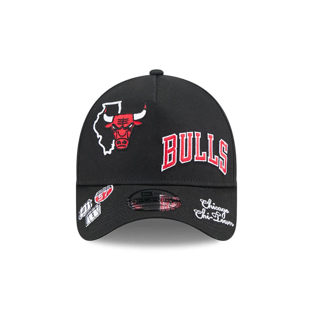 Chicago Bulls NBA All Over Black New Era 9FORTY A-Frame Adjustable Cap, front view showing a red and white Bulls logo alongside a white Illinois outline, red Bulls wordmark, and multiple embroidered patches on the black curved visor.