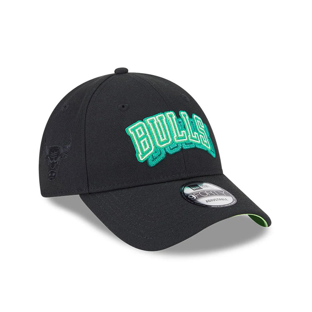 Chicago Bulls NBA Neon Black New Era 9FORTY Adjustable Cap, three-quarter view showing raised neon green Bulls lettering on the front panel, black embroidered bull logo on the left side.