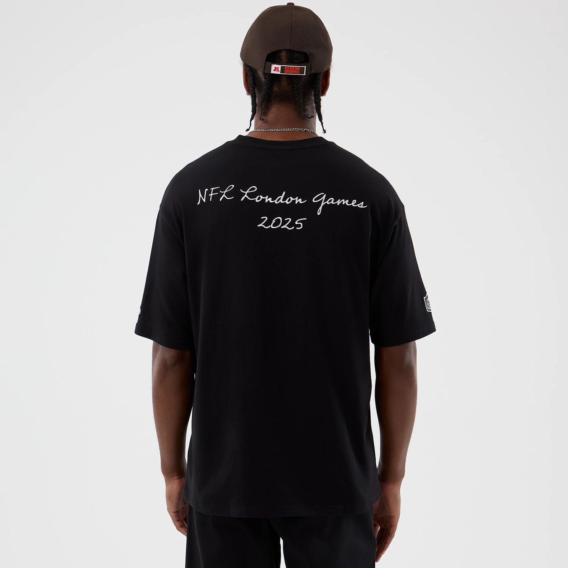 The Male model is wearing Cleveland Browns NFL International Series Games Black Oversized T-Shirt 2