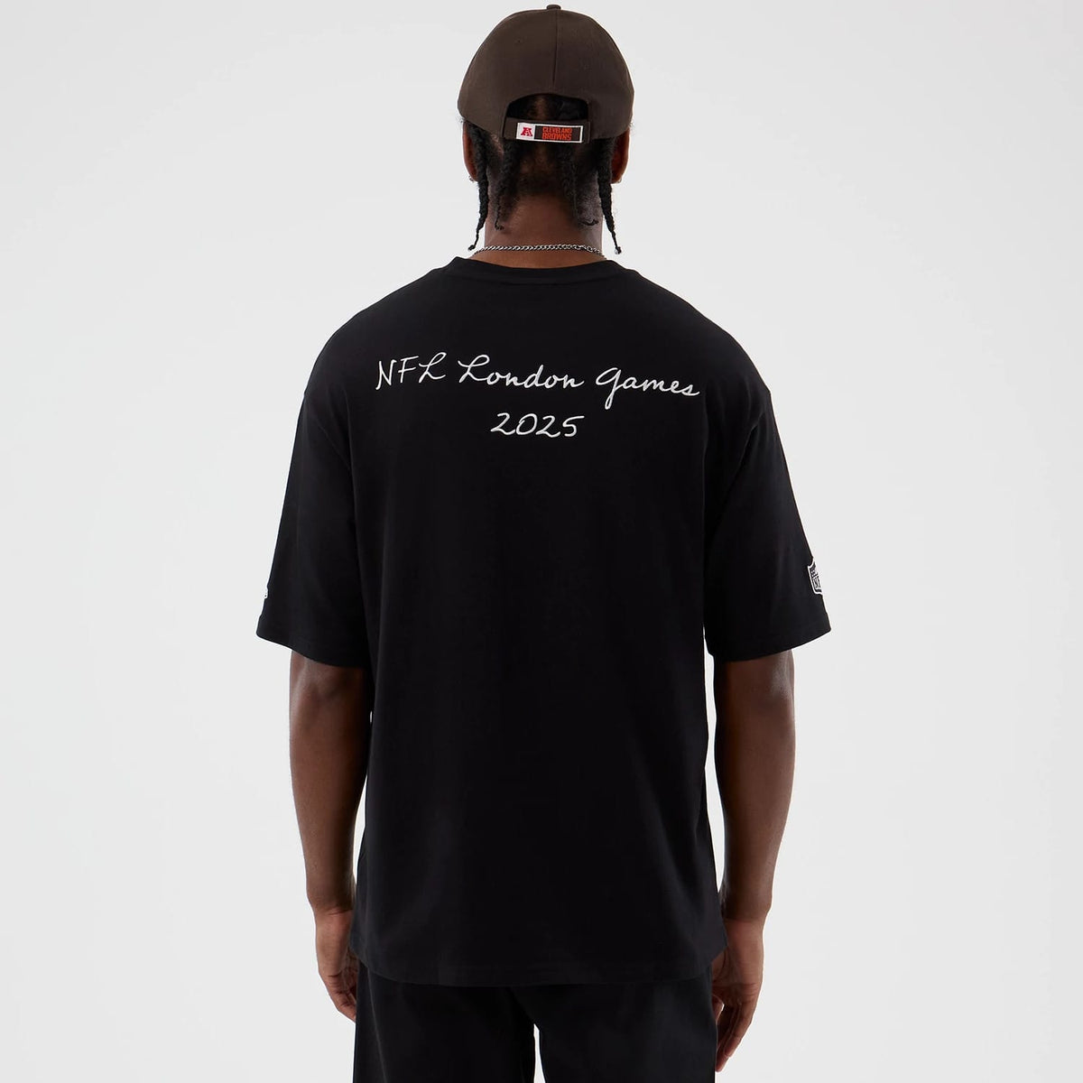 The Male model is wearing Cleveland Browns NFL International Series Games Black Oversized T-Shirt 2