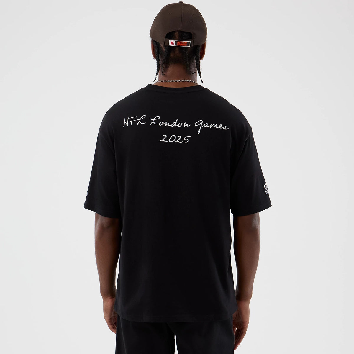 The Male model is wearing Cleveland Browns NFL International Series Games Black Oversized T-Shirt 2
