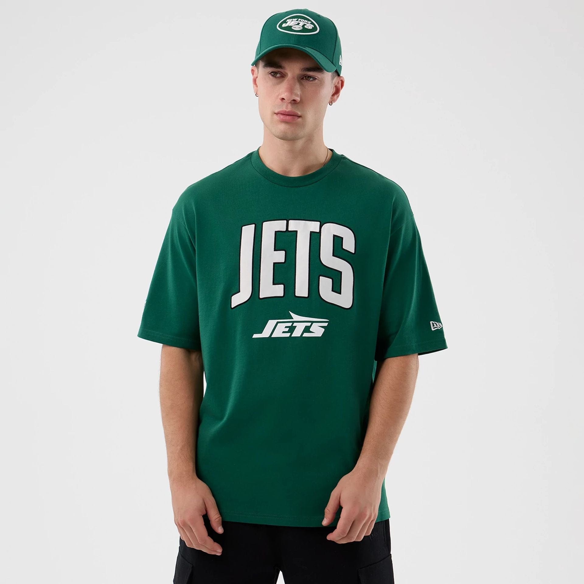 The Male model is wearing New York Jets NFL International Series Games Green Oversized T-Shirt 1