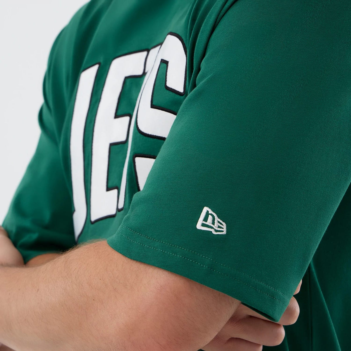 The Male model is wearing New York Jets NFL International Series Games Green Oversized T-Shirt 4