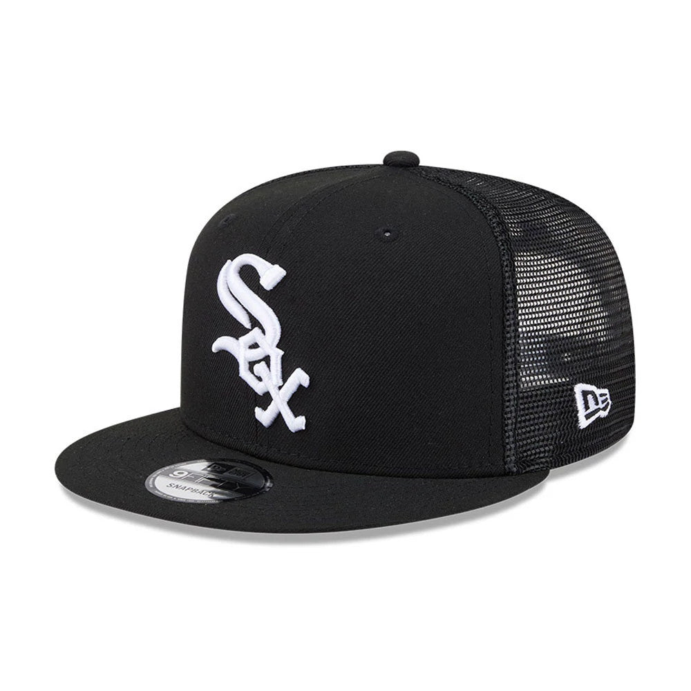 Chicago White Sox MLB Evergreen Black New Era 9FIFTY Trucker Adjustable Cap, three-quarter view showing the raised white Sox logo on the front panel, black mesh rear panels, and a 9FIFTY size sticker on the flat black visor.