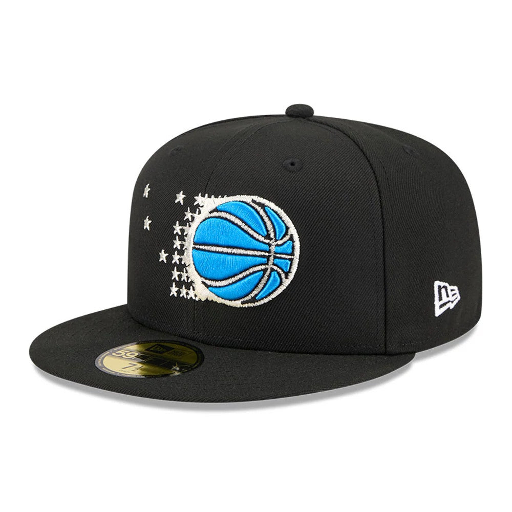 Orlando Magic NBA Hardwood Classic Black New Era 59FIFTY Fitted Cap, three-quarter view showing a large blue and white embroidered basketball logo on the front panel, a black flat visor with a gold 59FIFTY size sticker.