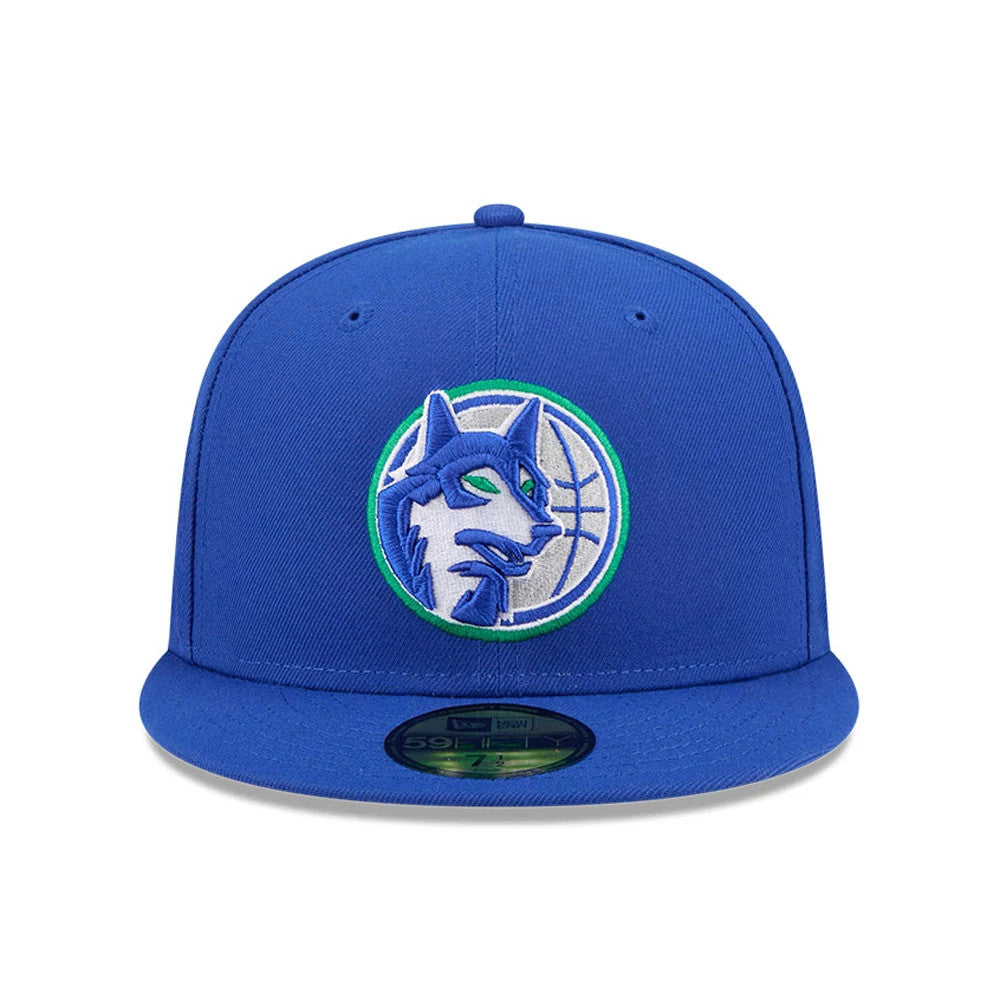 Minnesota Timberwolves NBA Hardwood Classic Blue New Era 59FIFTY Fitted Cap, front view showing a raised embroidered Timberwolves logo in blue and white on the front panel, with a matching blue flat visor and a gold 59FIFTY size sticker.