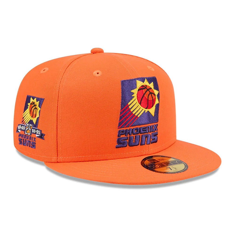 Phoenix Suns NBA Hardwood Classic Orange New Era 59FIFTY Fitted Cap, three-quarter view showing the purple and yellow team logo with raised embroidery on the front panel, a secondary logo on the side.