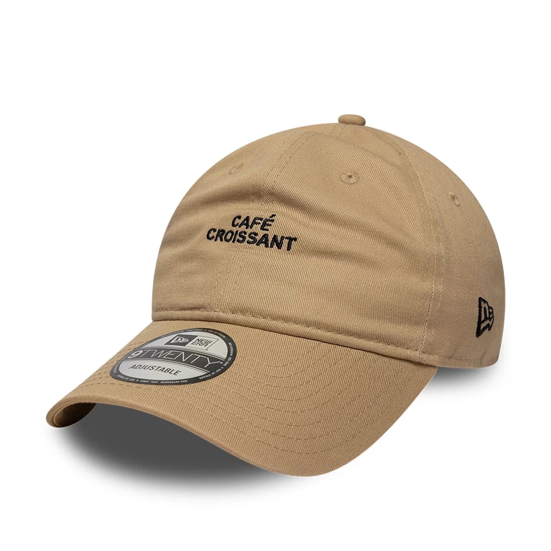 This is a New Era Slogan Café Croissant Light Beige 9TWENTY Adjustable Cap 1