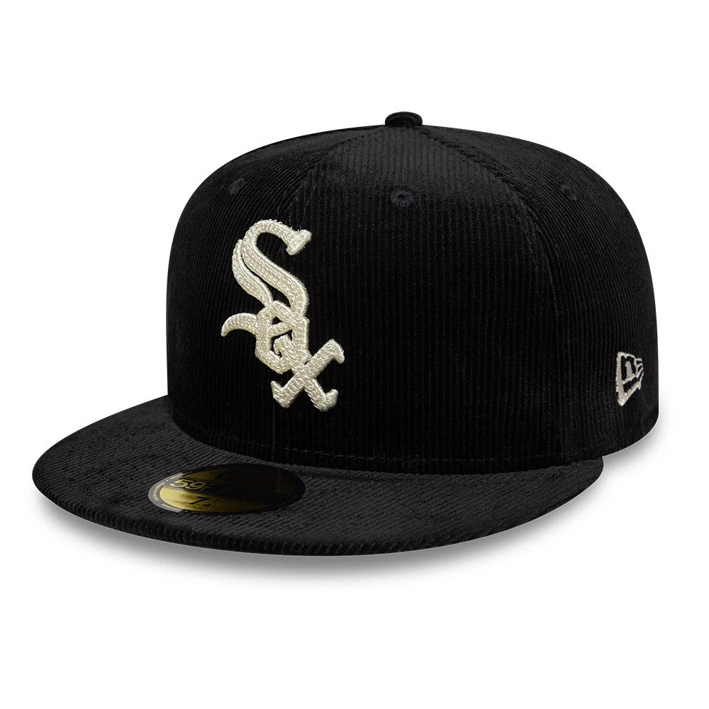 Chicago White Sox MLB Cord Black New Era 59FIFTY Fitted Cap, front view showing the raised white embroidered team logo on the structured black corduroy crown, with a gold 59FIFTY size sticker on the black flat visor.