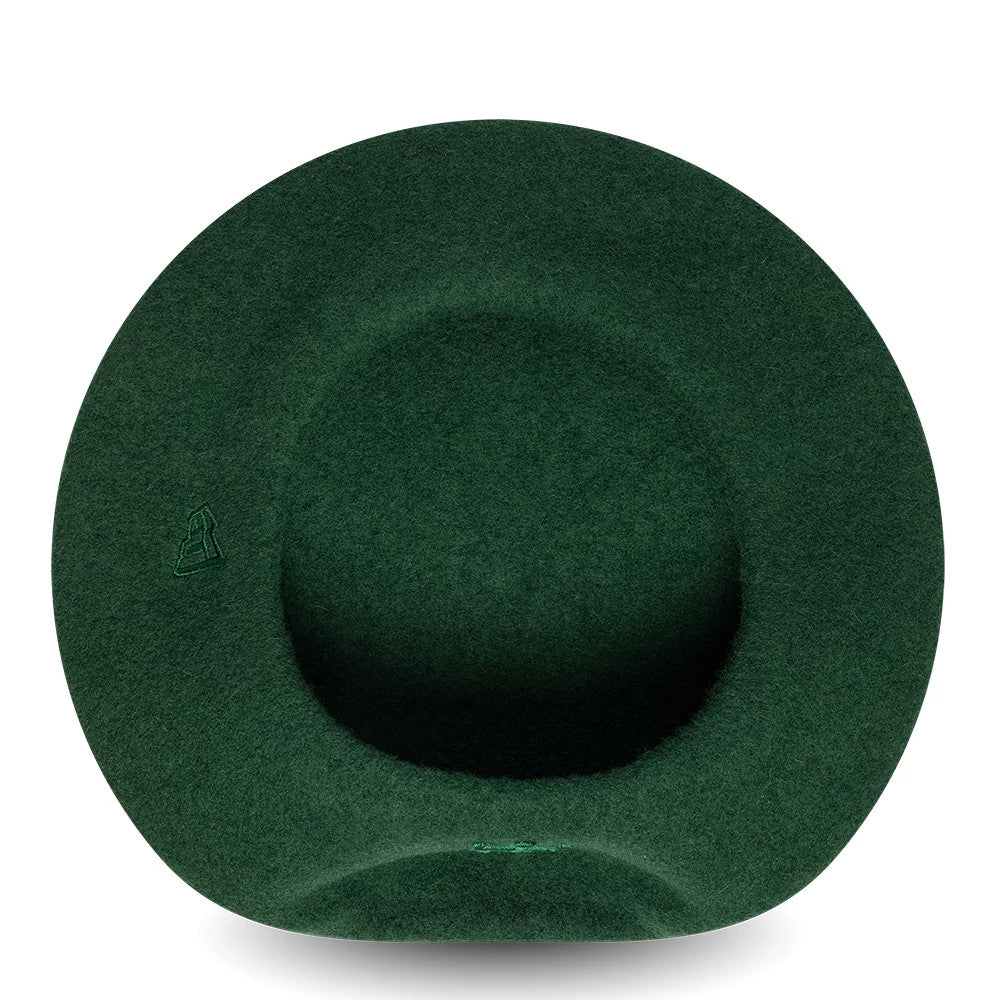 New Era New York Yankees Womens MLB Wool Dark Green Beret, top view showing the structured wool fabric with an embroidered New Era flag logo on the side, highlighting the beret's deep rounded crown.