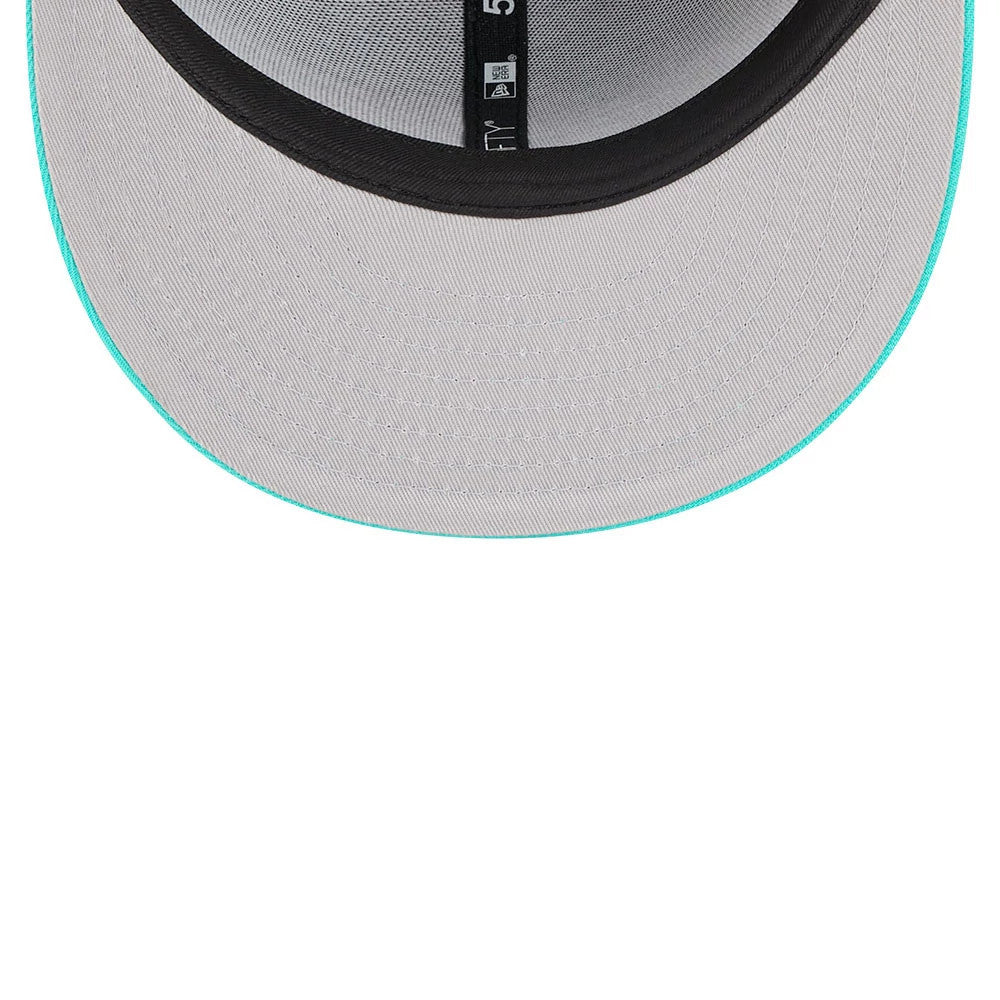 Memphis Grizzlies NBA Classic Black New Era 59FIFTY Fitted Cap, inside view showing the grey undervisor with a teal edge, black headband, and New Era logo on the black taping along the seams.