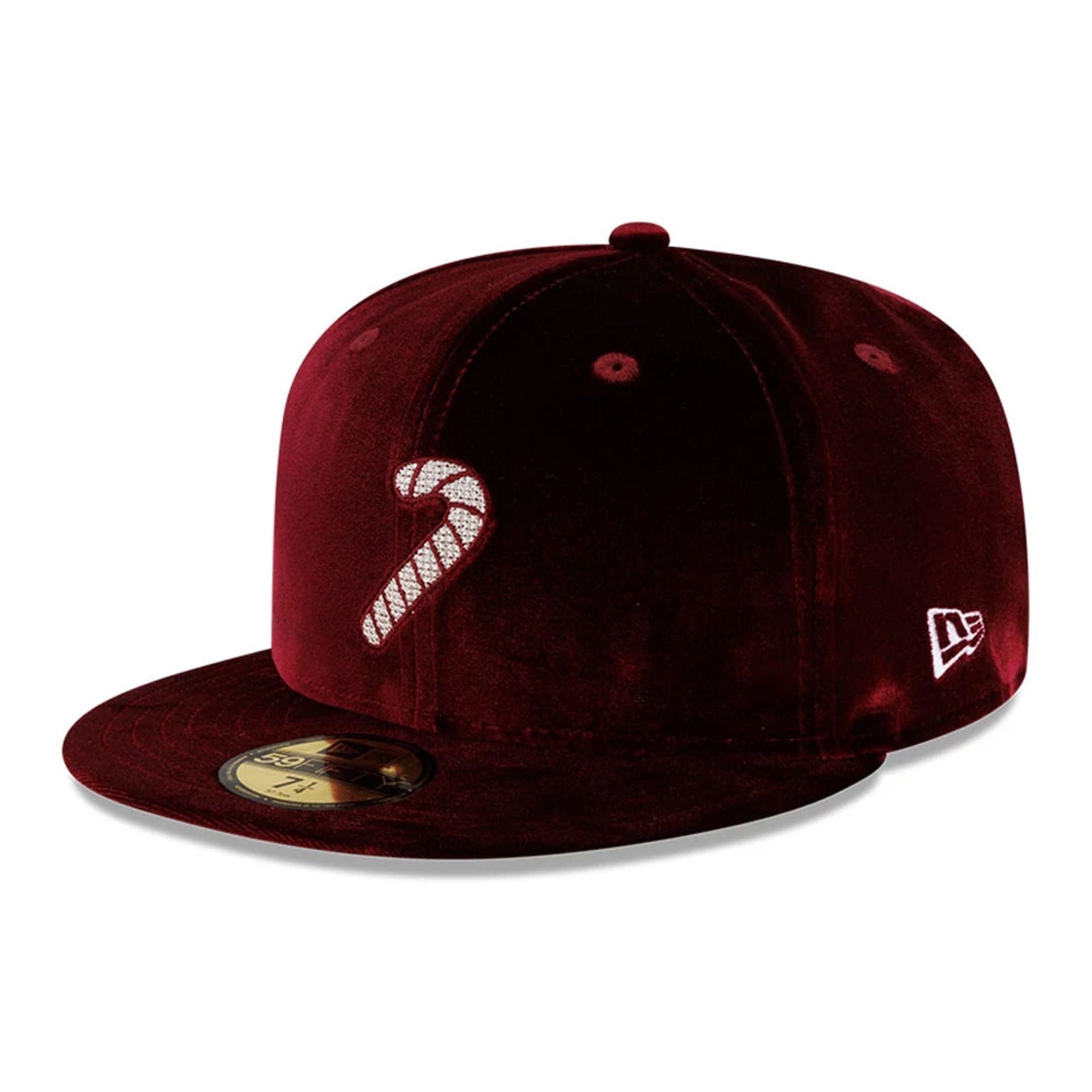 Pictured is this New Era Holiday Essentials 59FIFTY Fitted cap in dark red. 1