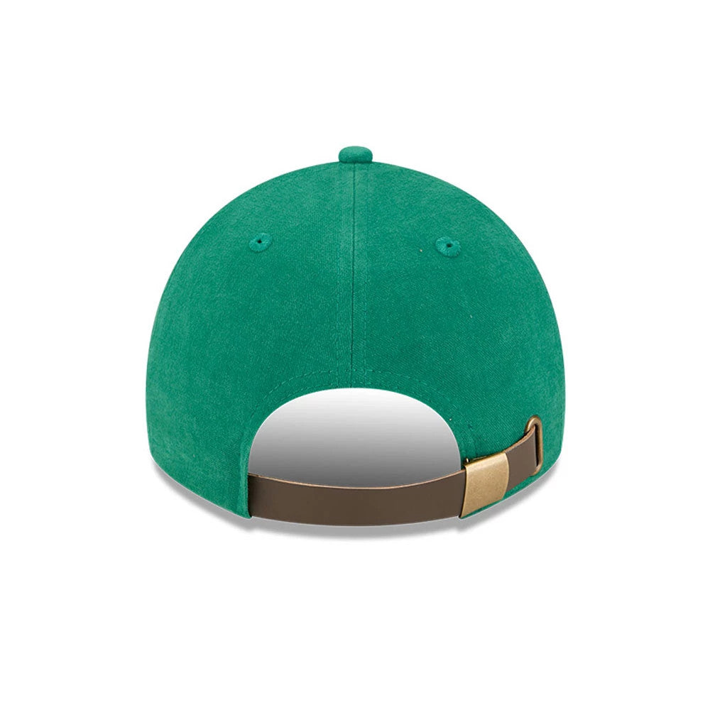 New Era Holiday Essentials Green 9TWENTY A-Frame Adjustable Cap, rear view showing the brown adjustable strap with a gold clasp and a structured green crown with eyelets and top button.