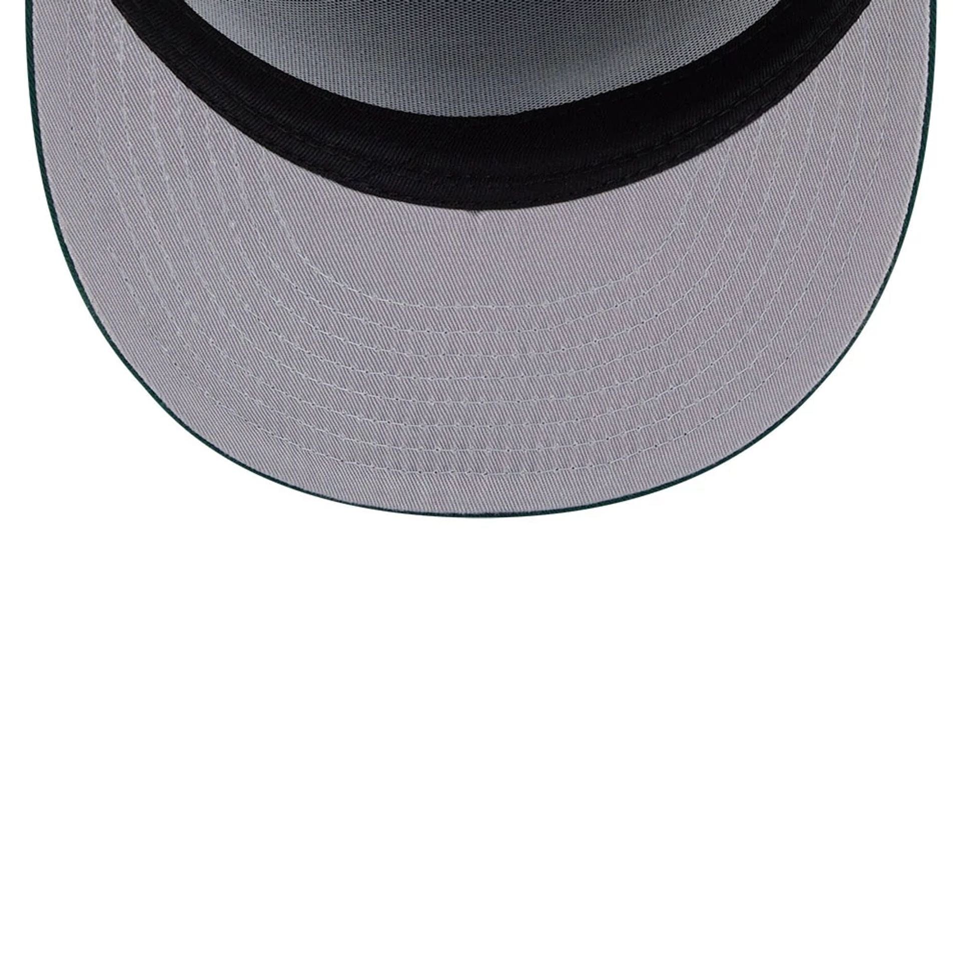 Pictured is this New Era Holiday Essentials 9FIFTY Split Panel Snapback cap in dark green. 2