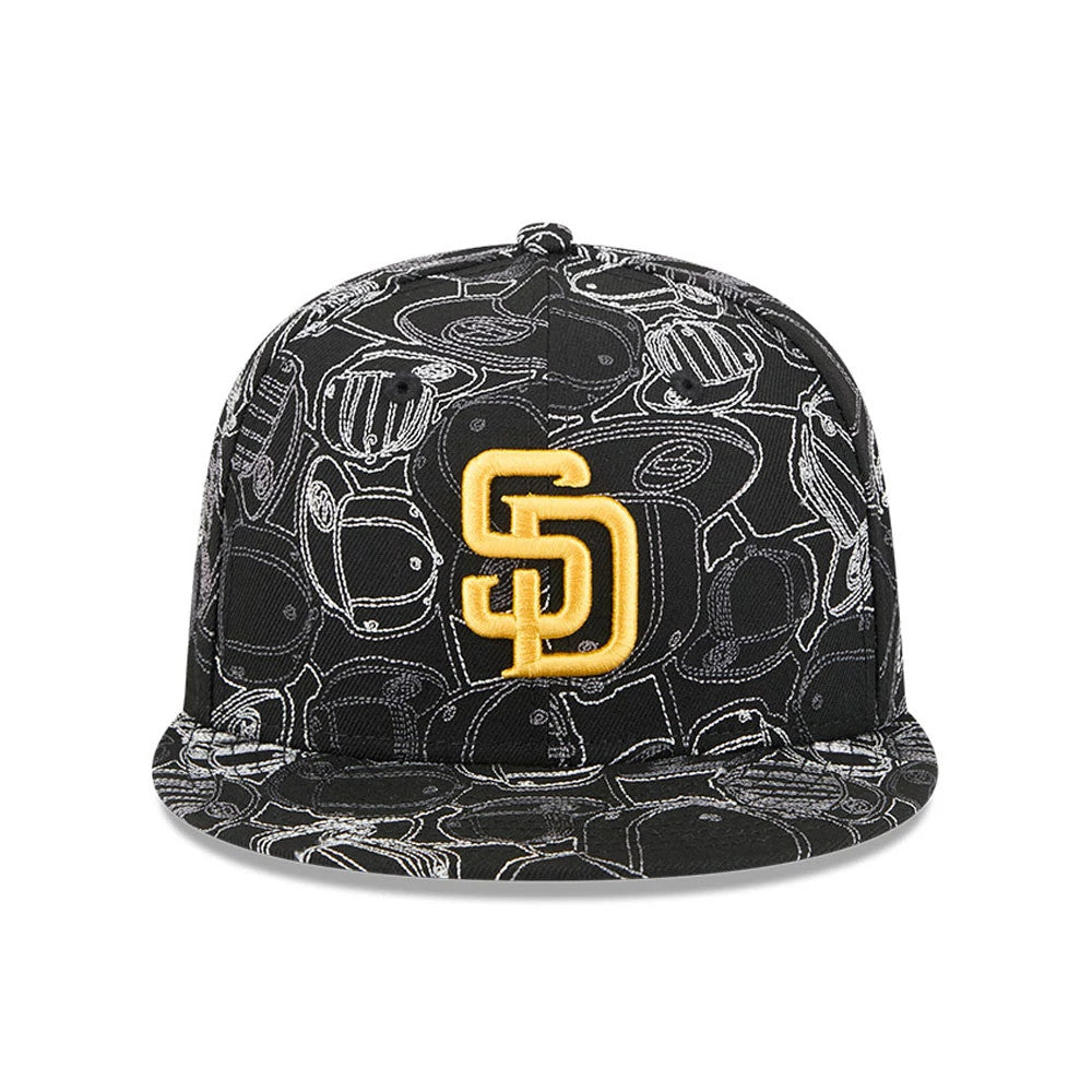 San Diego Padres MLB Cap Scramble Black New Era 59FIFTY Fitted Cap, front view showing the raised yellow SD logo on a black crown with an intricate white cap pattern and a matching flat visor.