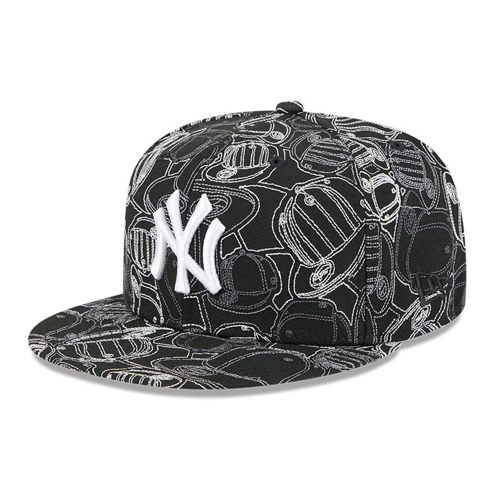 New York Yankees MLB Cap Scramble Black New Era 59FIFTY Fitted Cap, three-quarter view with a raised white embroidered NY logo on the front panel, detailed with an all-over cap pattern and a flat black visor.