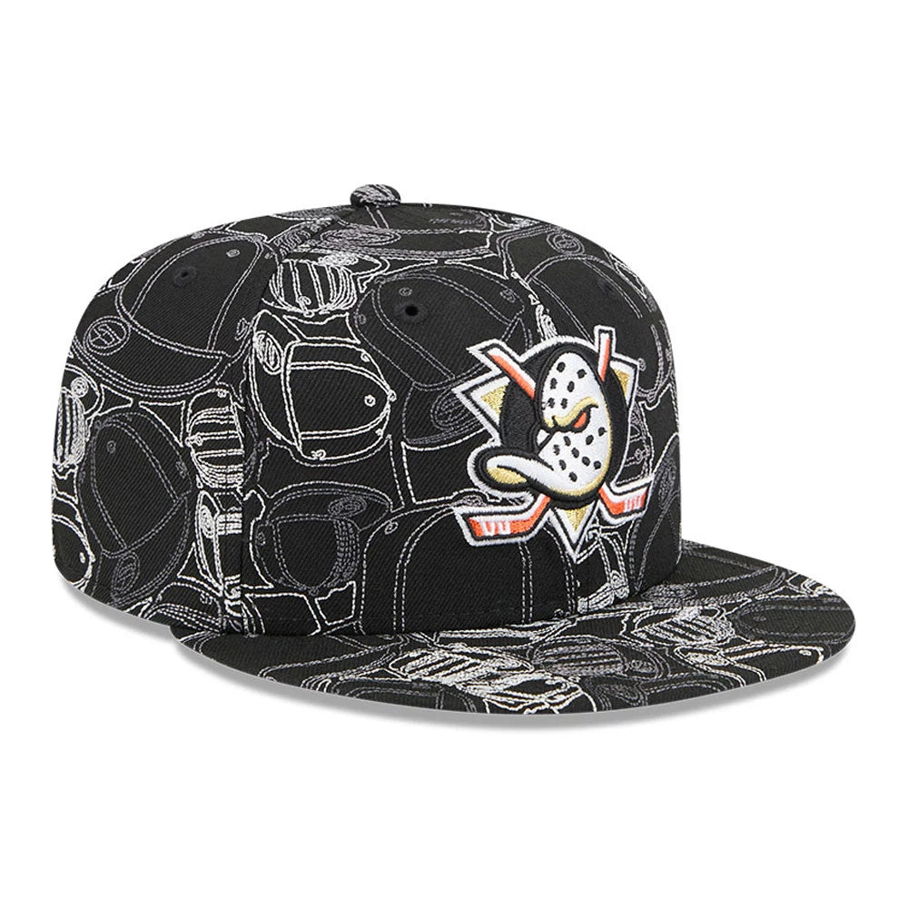 Anaheim Ducks NHL Cap Scramble Black New Era 59FIFTY Fitted Cap, three-quarter view showing the raised embroidered Mighty Ducks logo on the front panels, with a black visor featuring an intricate white outline pattern.