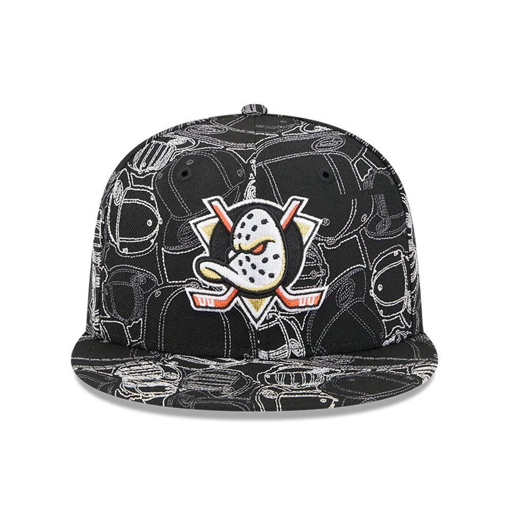 Anaheim Ducks NHL Cap Scramble Black New Era 59FIFTY Fitted Cap, front view showing the raised embroidered Anaheim Ducks logo on the structured crown with a black and white scramble graphic pattern and a flat black visor.