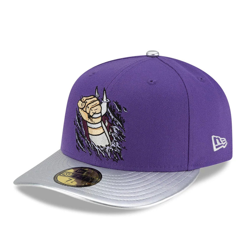Teenage Mutant Ninja Turtles Shredder Purple New Era 59FIFTY Fitted Cap, three-quarter view showing the embroidered Shredder fist graphic on the front panel, with a grey flat visor and gold 59FIFTY size sticker.