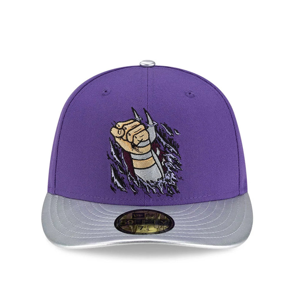 Teenage Mutant Ninja Turtles Shredder Purple New Era 59FIFTY Fitted Cap, front view showing a detailed embroidered Shredder logo on the purple structured crown, with a contrasting grey visor and black and gold 59FIFTY size sticker.