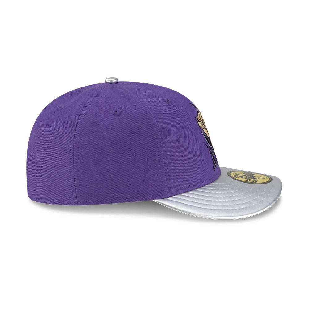 Teenage Mutant Ninja Turtles Shredder Purple New Era 59FIFTY Fitted Cap, side view showing the grey curved visor, embroidered Shredder graphic on the front panel, and purple crown with eyelets and top button.