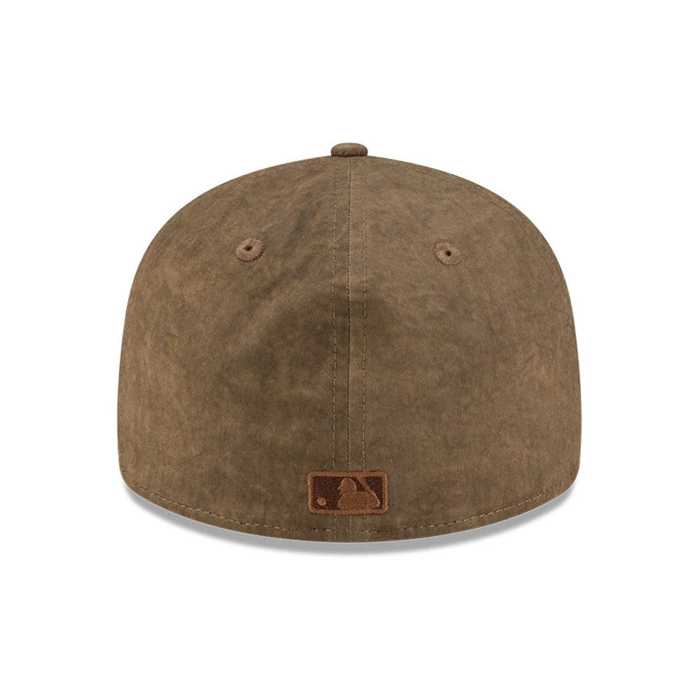 New York Yankees MLB Open Brown Retro Crown New Era 59FIFTY Fitted Cap, rear view showing a brown embroidered MLB Batterman logo at the centre of the back panels, with seam details and matching eyelets on the brown crown.