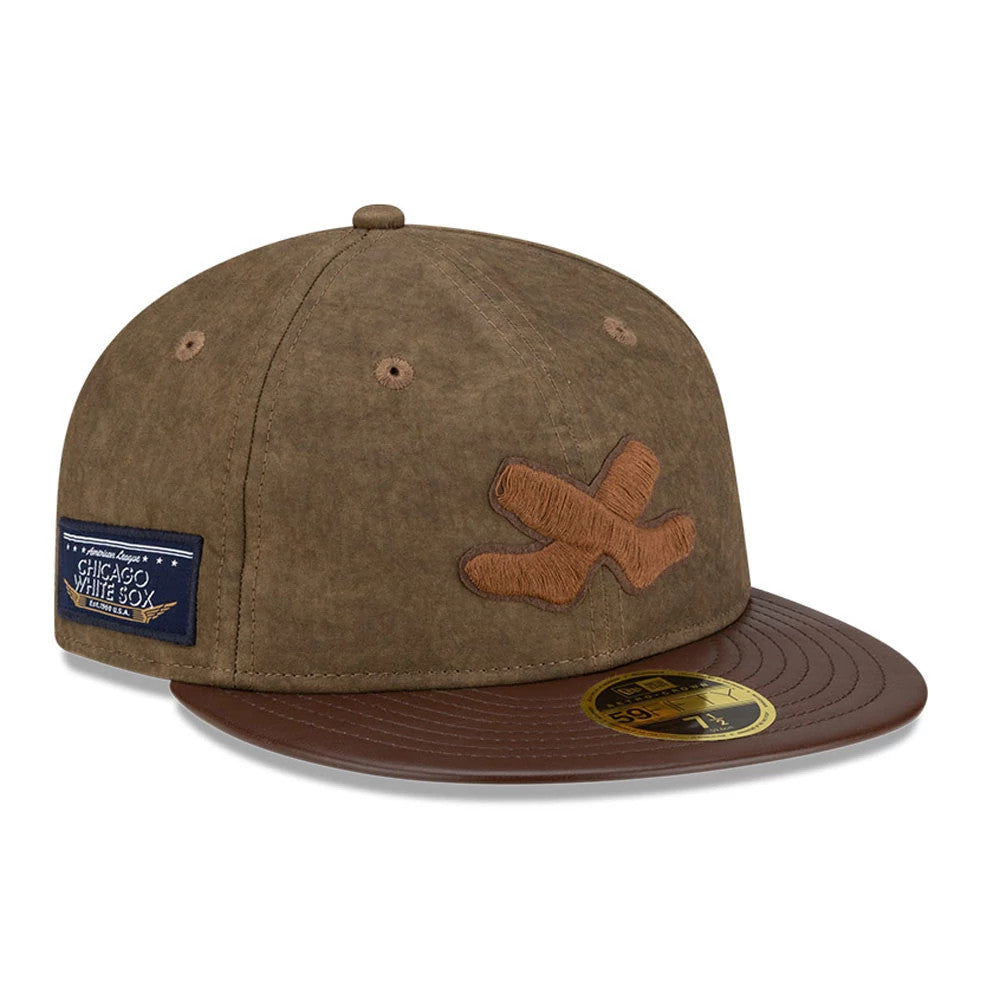 Chicago White Sox MLB Open Brown Retro Crown New Era 59FIFTY Fitted Cap, three-quarter view showing a large brown X logo on the front panel, brown faux leather visor and gold 59FIFTY size sticker, with a Chicago patch on the side.