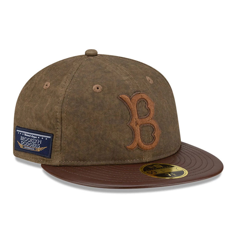 Brooklyn Dodgers MLB Open Brown Retro Crown New Era 59FIFTY Fitted Cap, three-quarter view showing the brown embroidered B logo on the front panel, blue side patch, and brown flat visor with a gold 59FIFTY size sticker.