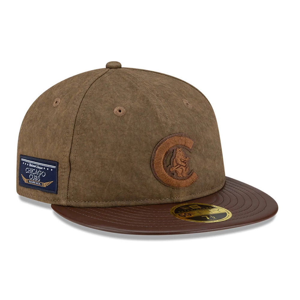 Chicago Cubs MLB Open Brown Retro Crown New Era 59FIFTY Fitted Cap, front view showing the brown embroidered C logo on the front panel, a darker brown flat visor with a gold 59FIFTY size sticker, and the New Era patch on the left side.