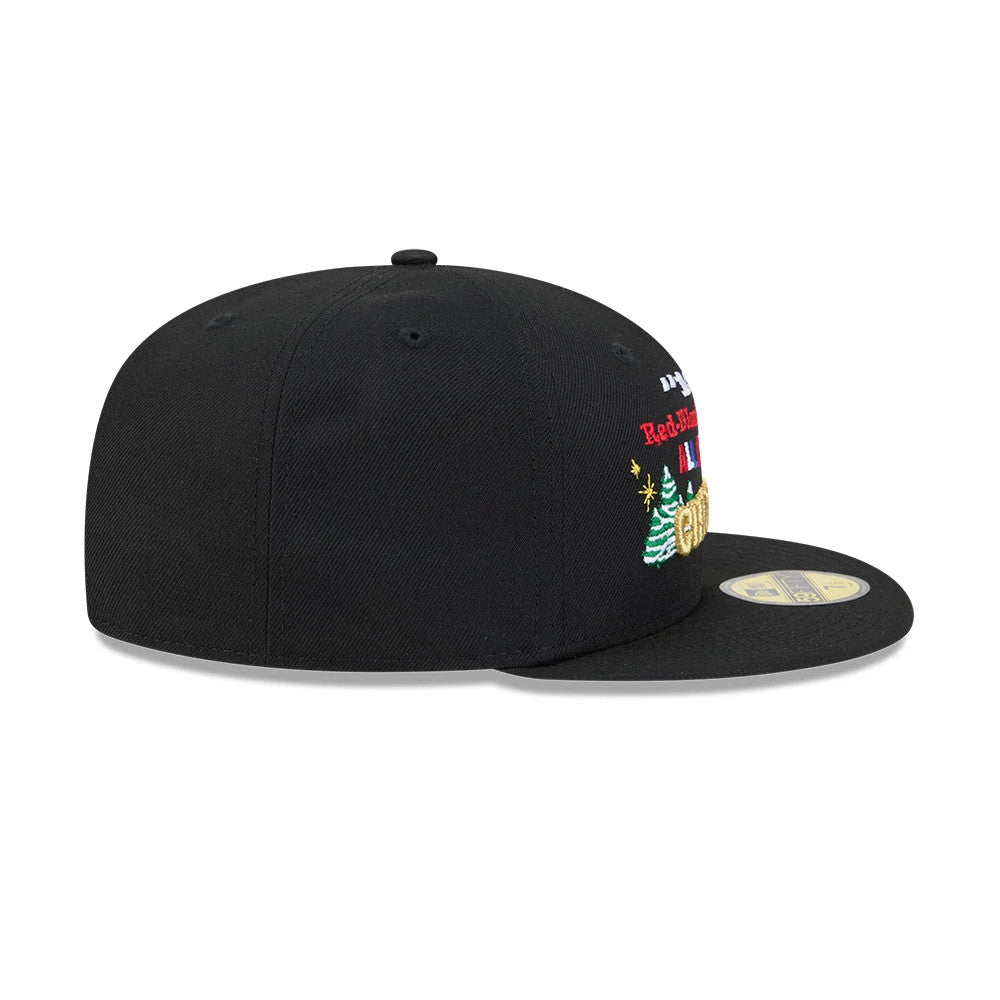 A Christmas Story Warner Brothers Black New Era 59FIFTY Fitted Cap, side view showing embroidery of Christmas trees and festive lettering on the front panel, with a black flat visor and a gold 59FIFTY size sticker.