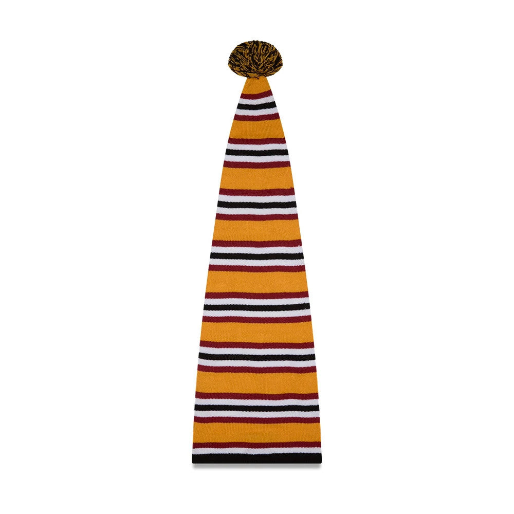 New Era A Christmas Story Warner Brothers Black Cuff Knit Beanie Hat, rear view showing an elongated striped design in orange, black, and white bands with a black and orange pom-pom on top.
