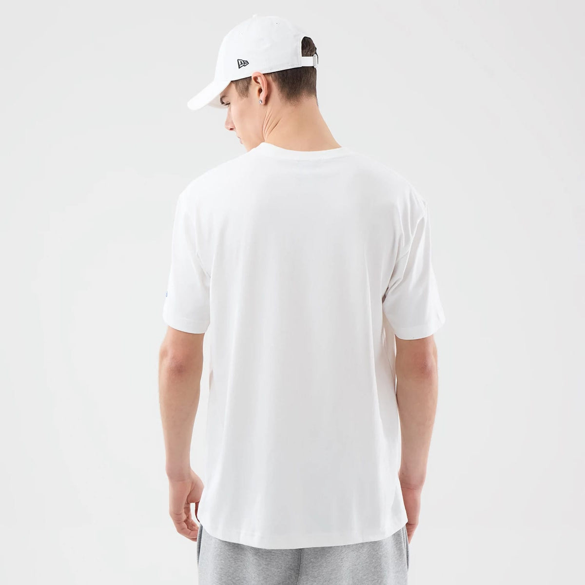 The model is wearing this Space Jam 2 X NBA Brooklyn Nets T-Shirt in white. 2