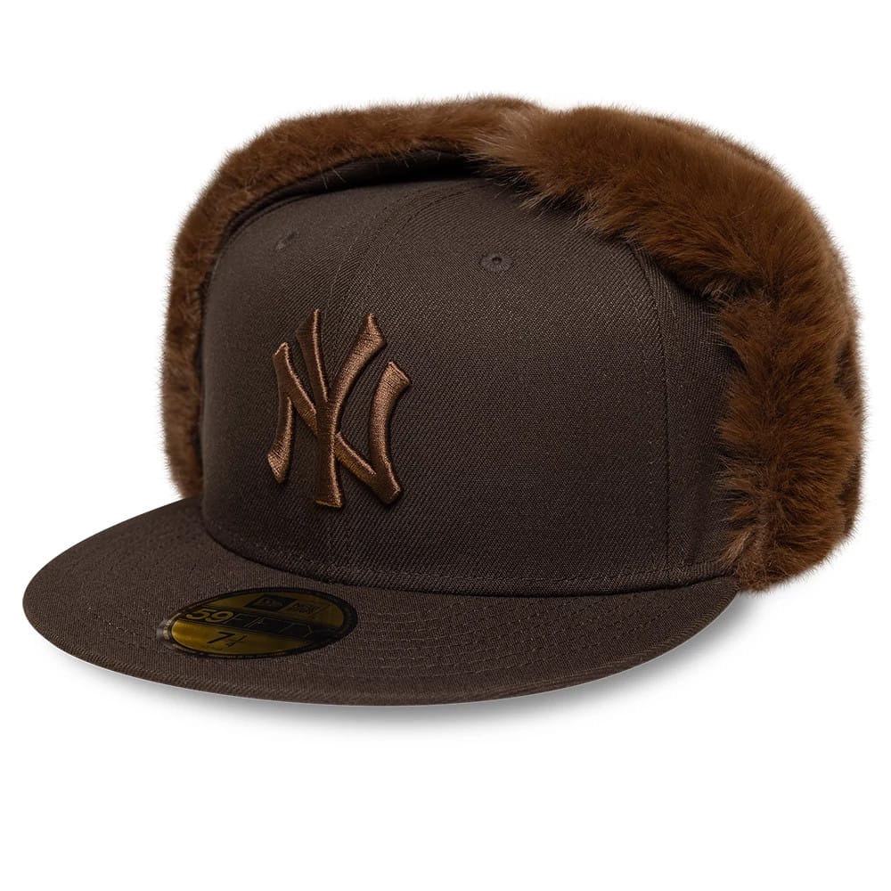 Pictured is this MLB World Series New York Yankees Dogear 59FIFTY Fitted cap in dark brown. 4
