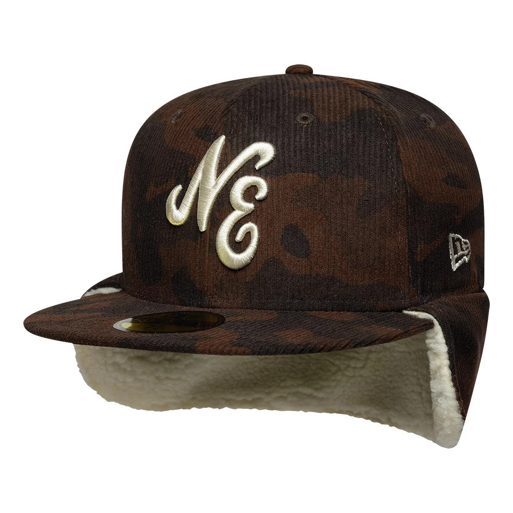 New Era Cord Dark Brown Downflap 59FIFTY Fitted Cap, three-quarter view showing large white embroidered NE script logo on the front panel, gold 59FIFTY size sticker on the flat visor, and dark brown corduroy texture with ear flaps.