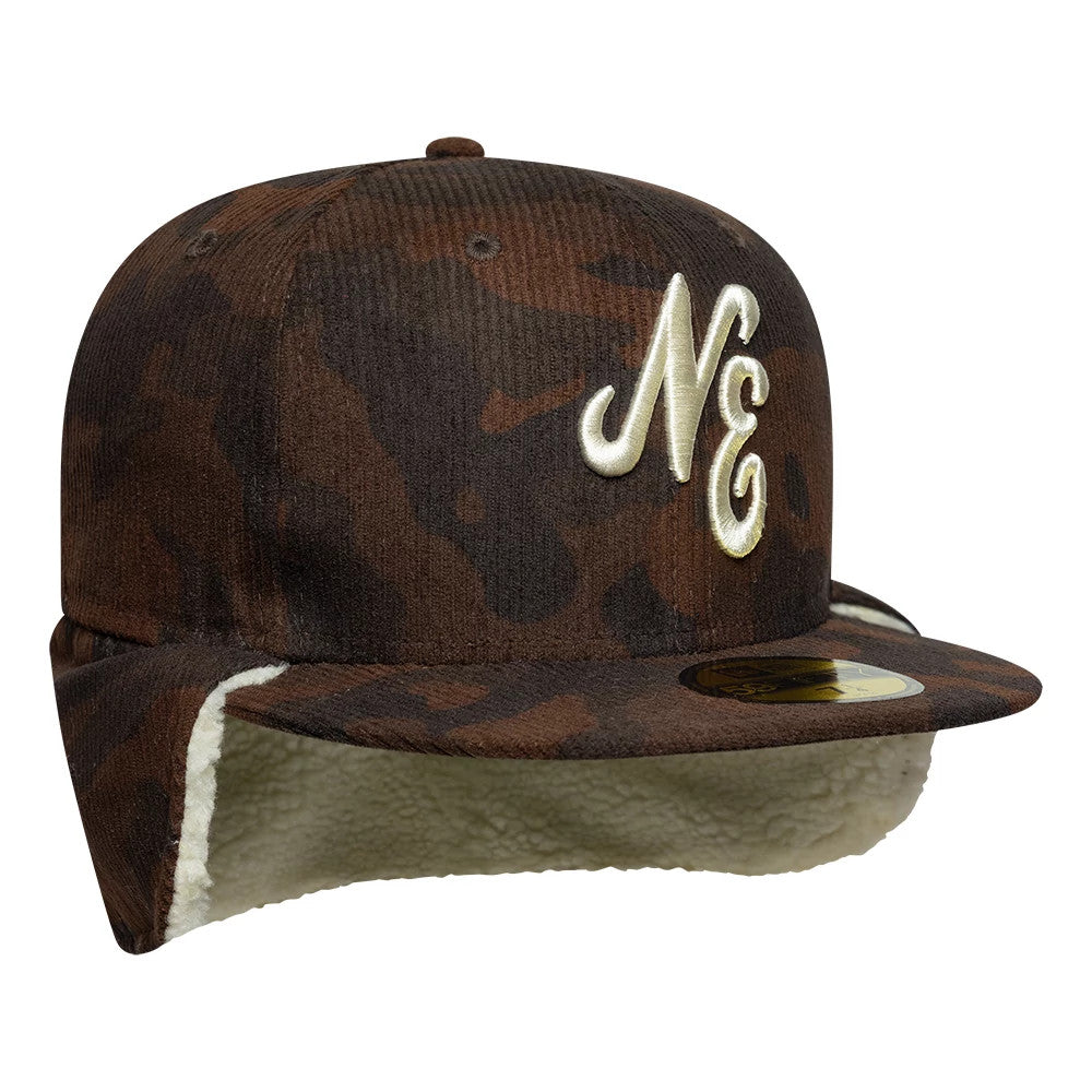 New Era Cord Dark Brown Downflap 59FIFTY Fitted Cap, three-quarter view showing cream embroidered NE logo on the front panel, camouflage pattern on the dark brown visor with gold 59FIFTY size sticker, and cream fleece lining on the downflap.
