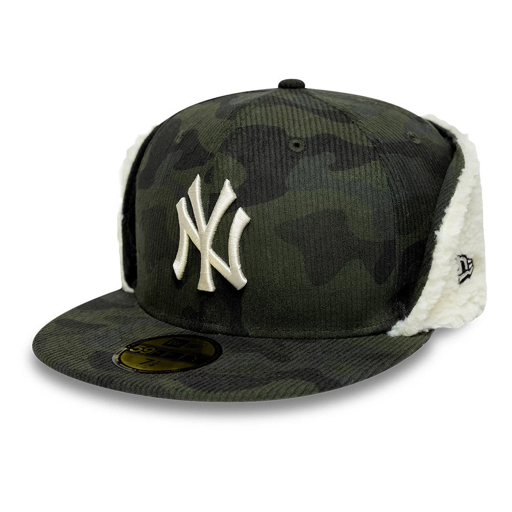 New York Yankees MLB Cord Green Downflap New Era 59FIFTY Fitted Cap, three-quarter view showing the white raised NY logo on the front panel, camo-patterned corduroy fabric finish, curved visor, and 59FIFTY size sticker on the top of the visor.