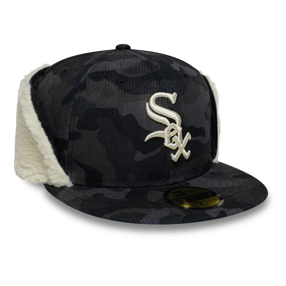 Chicago White Sox MLB Cord Black Downflap New Era 59FIFTY Fitted Cap, three-quarter view showing the raised white Sox logo on black camo corduroy front panels, with downflap ear covers and a gold 59FIFTY size sticker on the visor.