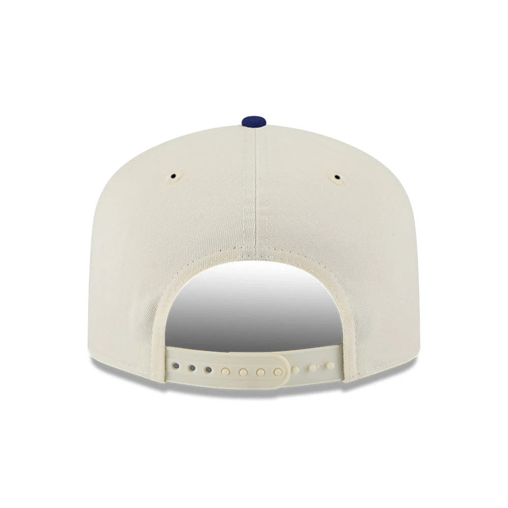LA Dodgers MLB 2 Tone Washed Cream New Era 19TWENTY Adjustable Cap, rear view showing cream panels and a blue top button, with an adjustable cream strap and embroidered eyelets on the crown for optimal fit.