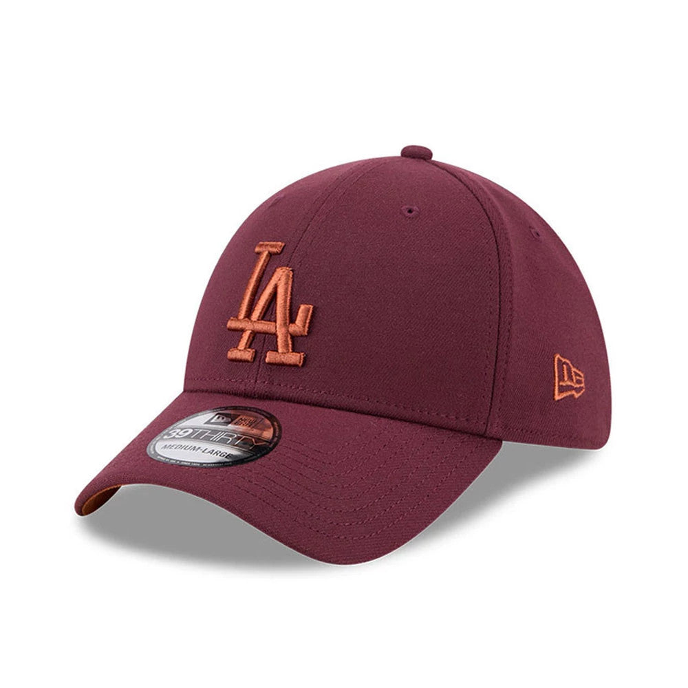 LA Dodgers MLB Frosted Rust Dark Red New Era 39THIRTY Stretch Fit Cap, three-quarter view showing a raised orange LA logo on the structured dark red crown, matching orange New Era flag logo on the left side.